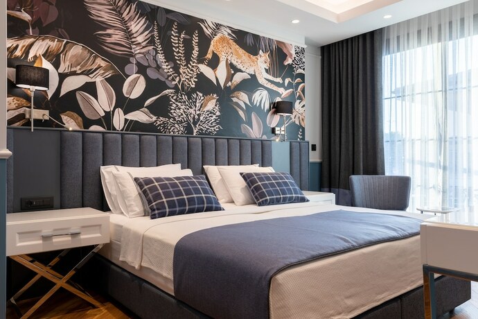 Imagen de la habitación del Motif Hotel. Foto 12