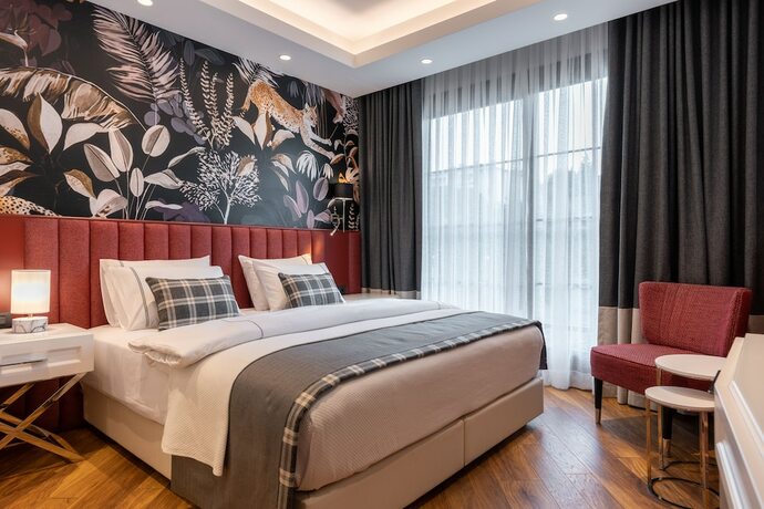 Imagen de la habitación del Motif Hotel. Foto 15