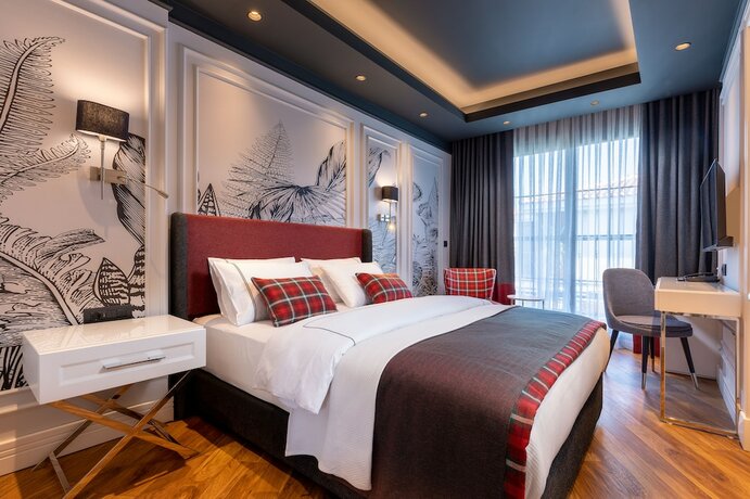 Imagen de la habitación del Motif Hotel. Foto 16