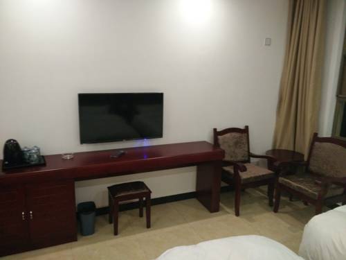Imagen de la habitación del Mount Emei Feng Lin Yue Hotel. Foto 3