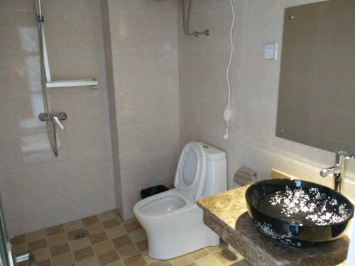 Imagen de la habitación del Mount Emei Feng Lin Yue Hotel. Foto 6