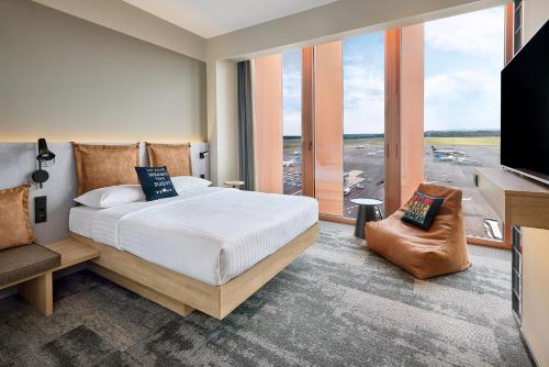Imagen de la habitación del Moxy Luxembourg Airport. Foto 19