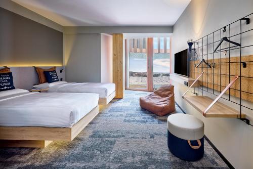 Imagen de la habitación del Moxy Luxembourg Airport. Foto 20