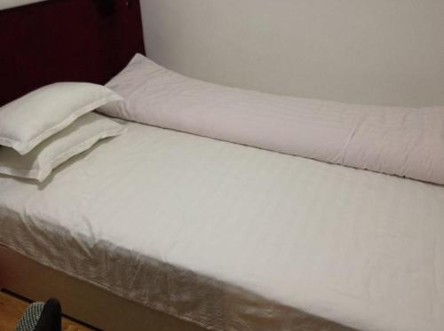 Imagen de la habitación del Mudanjiang Xinhe Guesthouse. Foto 6