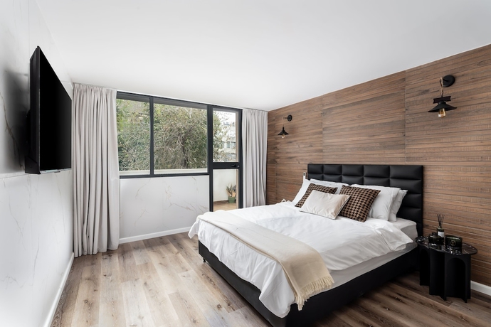 Imagen de la habitación del Mulan TLV Hotel. Foto 2