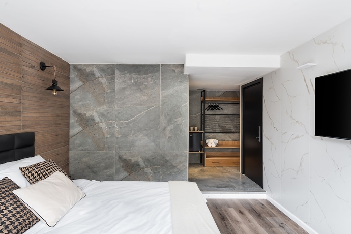 Imagen de la habitación del Mulan TLV Hotel. Foto 3