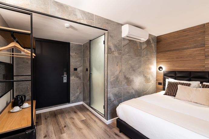 Imagen de la habitación del Mulan TLV Hotel. Foto 9