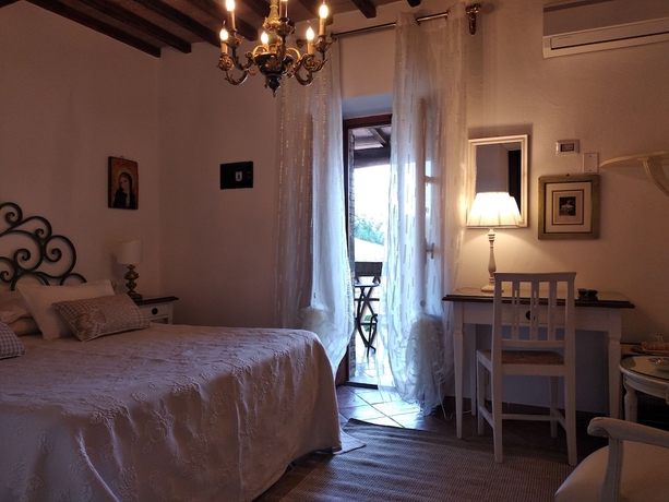 Imagen de la habitación del Mulino di Quercegrossa. Foto 2