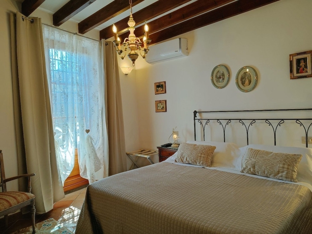 Imagen de la habitación del Mulino di Quercegrossa. Foto 6