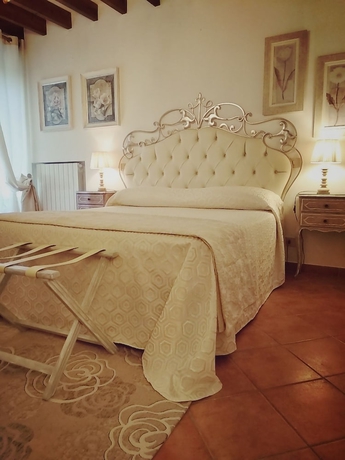 Imagen de la habitación del Mulino di Quercegrossa. Foto 12