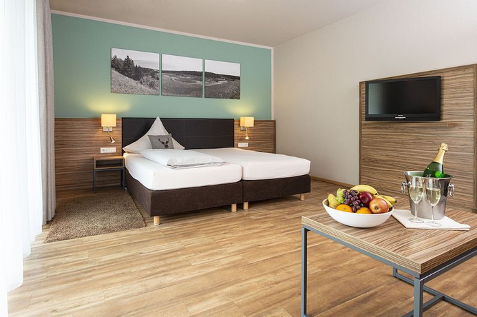 Imagen de la habitación del M&uuml;llers Landhotel. Foto 10