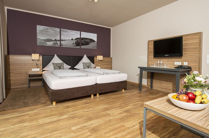 Imagen de la habitación del M&uuml;llers Landhotel. Foto 12