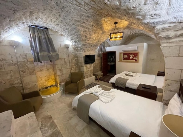 Imagen de la habitación del M&uuml;zepotamia Butik Otel. Foto 5