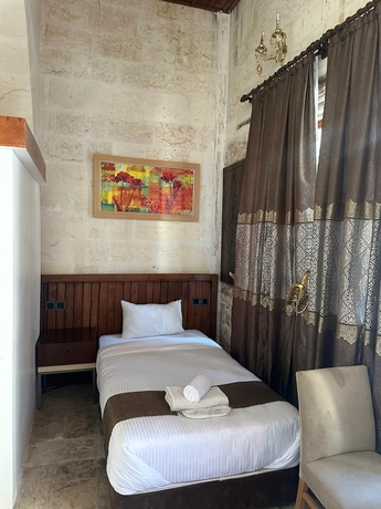 Imagen de la habitación del M&uuml;zepotamia Butik Otel. Foto 7