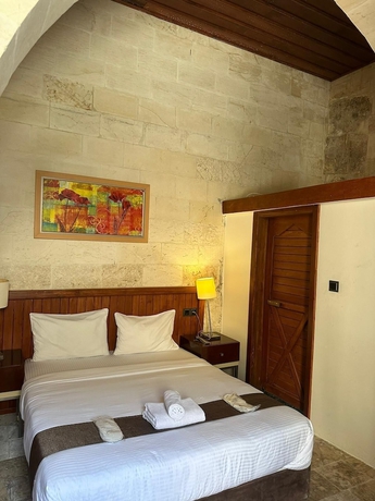 Imagen de la habitación del M&uuml;zepotamia Butik Otel. Foto 8
