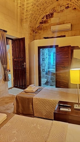 Imagen de la habitación del M&uuml;zepotamia Butik Otel. Foto 11