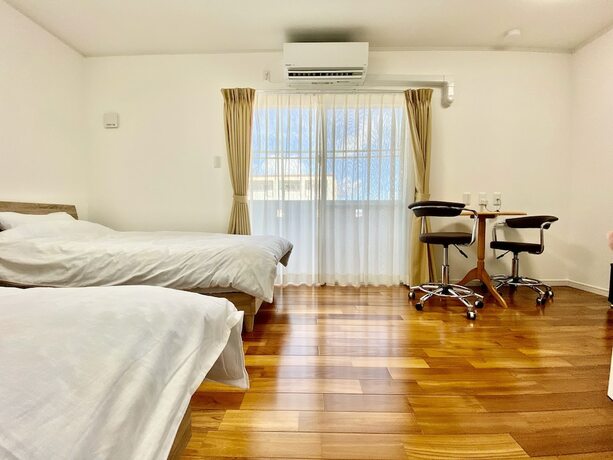 Imagen de la habitación del M-villaggio Miyakojima. Foto 18