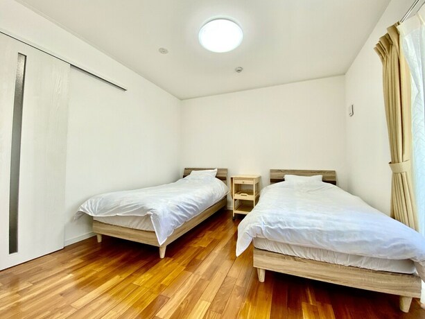 Imagen de la habitación del M-villaggio Miyakojima. Foto 19