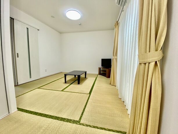 Imagen de la habitación del M-villaggio Miyakojima. Foto 24