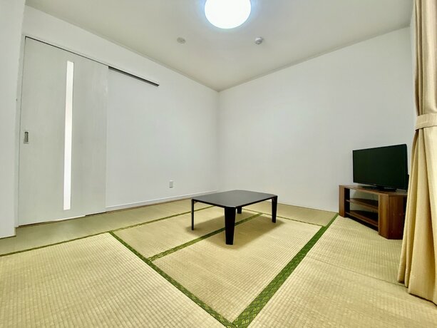 Imagen de la habitación del M-villaggio Miyakojima. Foto 30
