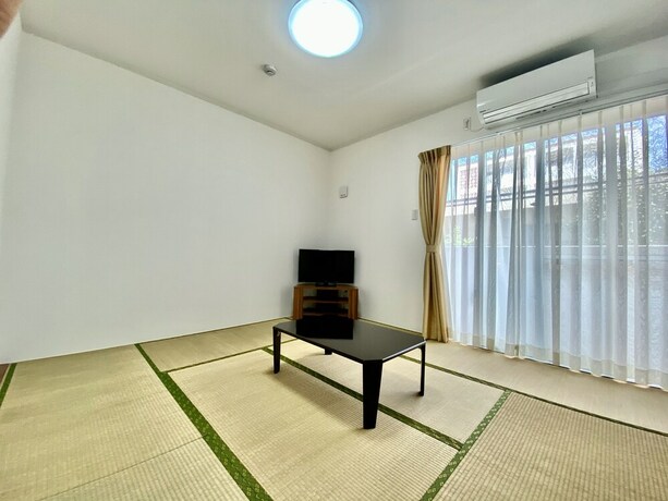 Imagen de la habitación del M-villaggio Miyakojima. Foto 36