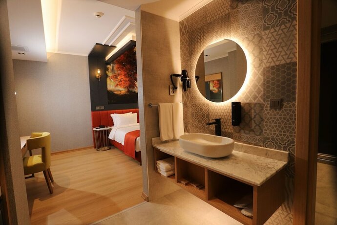 Imagen de la habitación del My Garden Suites. Foto 12