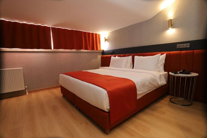 Imagen de la habitación del My Garden Suites. Foto 13