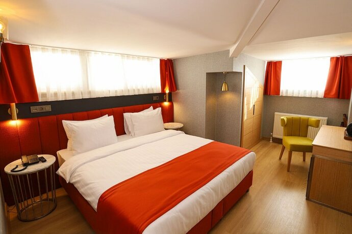 Imagen de la habitación del My Garden Suites. Foto 17