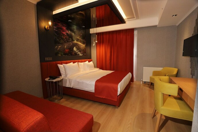 Imagen de la habitación del My Garden Suites. Foto 19