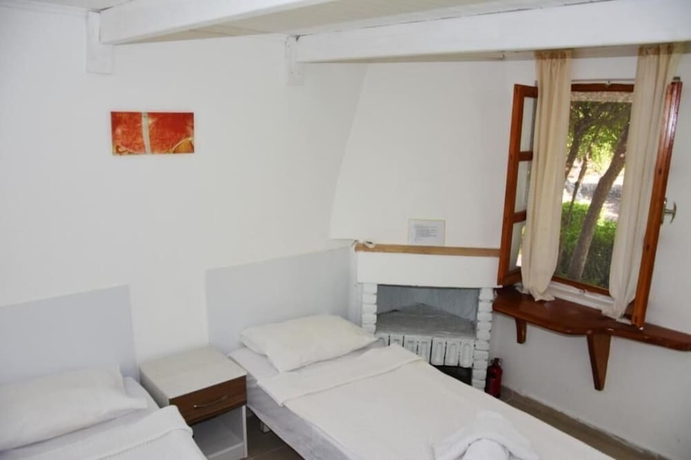 Imagen de la habitación del Myndos Bed and Breakfast. Foto 17