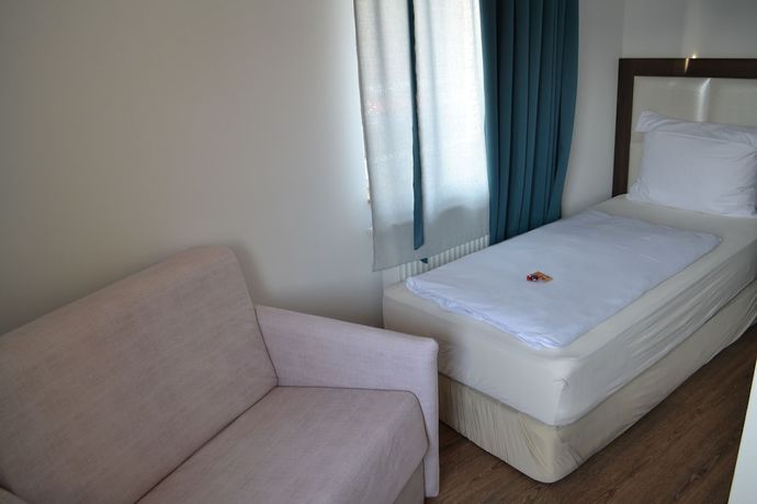 Imagen de la habitación del Myrsini Hotel. Foto 11