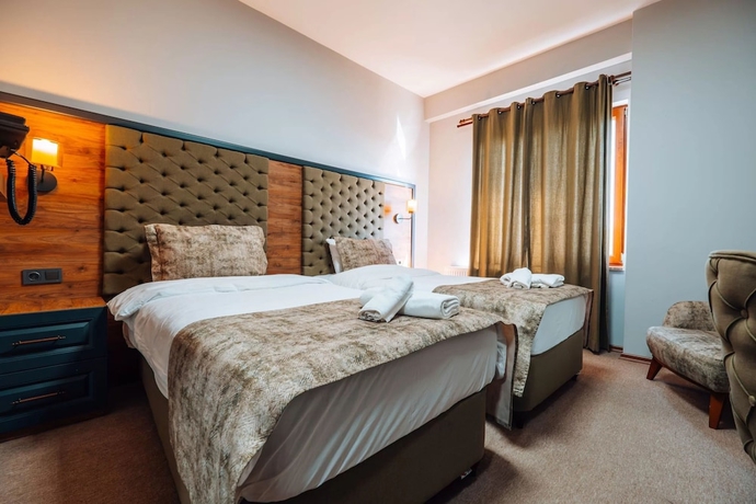 Imagen de la habitación del Mysia Olympos Hotel. Foto 7