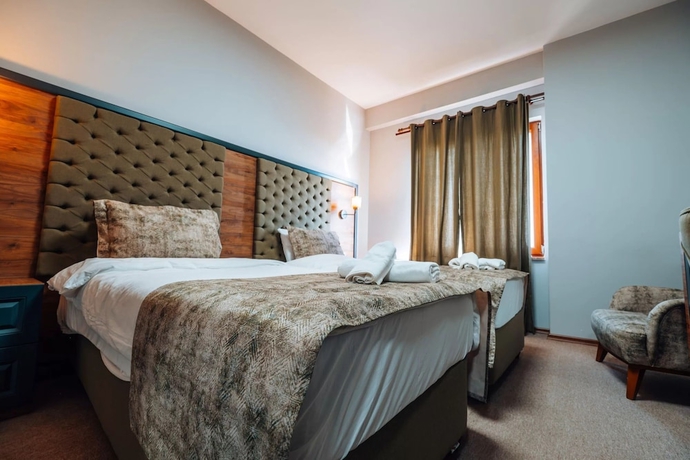 Imagen de la habitación del Mysia Olympos Hotel. Foto 11