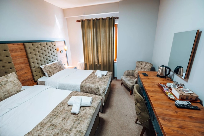 Imagen de la habitación del Mysia Olympos Hotel. Foto 12