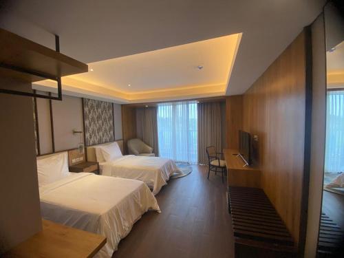 Imagen de la habitación del Myze Hotel Sumenep. Foto 9