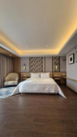 Imagen de la habitación del Myze Hotel Sumenep. Foto 11