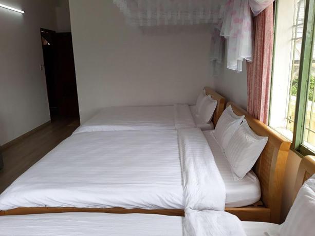 Imagen de la habitación del NGOC BICH HOTEL. Foto 5