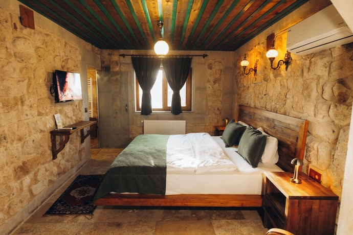 Imagen de la habitación del NİSSA CAVE PANSİYON. Foto 6