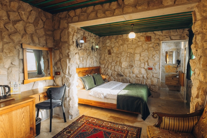 Imagen de la habitación del NİSSA CAVE PANSİYON. Foto 8