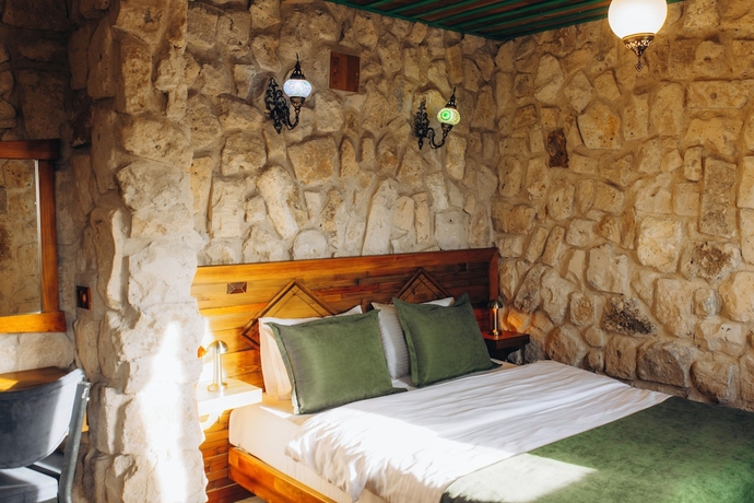 Imagen de la habitación del NİSSA CAVE PANSİYON. Foto 9