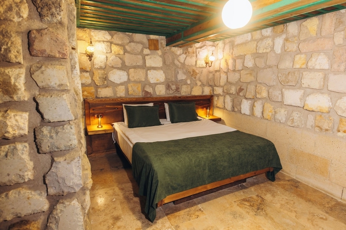 Imagen de la habitación del NİSSA CAVE PANSİYON. Foto 10