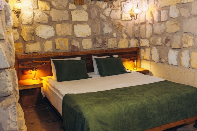 Imagen de la habitación del NİSSA CAVE PANSİYON. Foto 11
