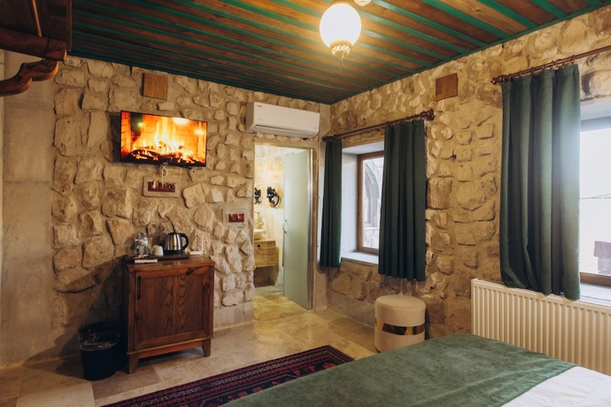 Imagen de la habitación del NİSSA CAVE PANSİYON. Foto 13