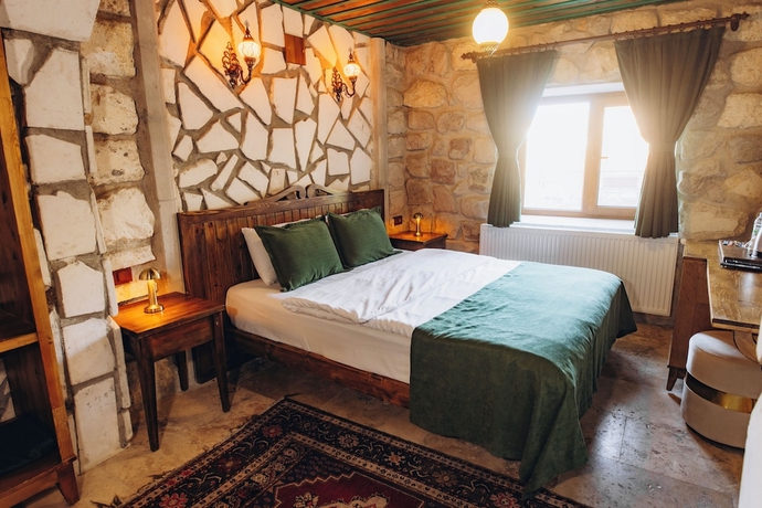 Imagen de la habitación del NİSSA CAVE PANSİYON. Foto 15