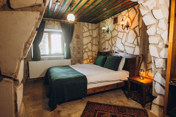 Imagen de la habitación del NİSSA CAVE PANSİYON. Foto 16