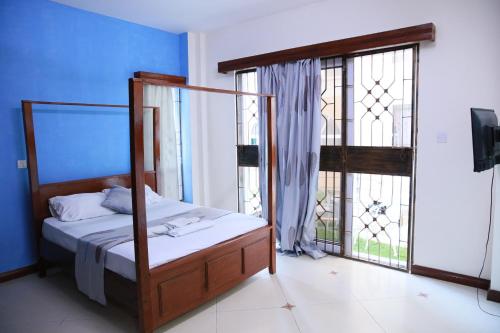 Imagen de la habitación del NYALI ENSUITE ROOMS WITH SWIMMING POOL, MOMBASA. Foto 20
