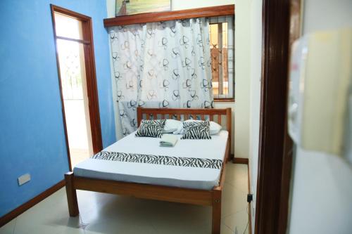 Imagen general del NYALI ENSUITE ROOMS WITH SWIMMING POOL, MOMBASA. Foto 18