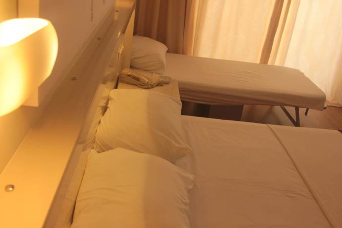 Imagen de la habitación del Nagidos Hotel. Foto 11