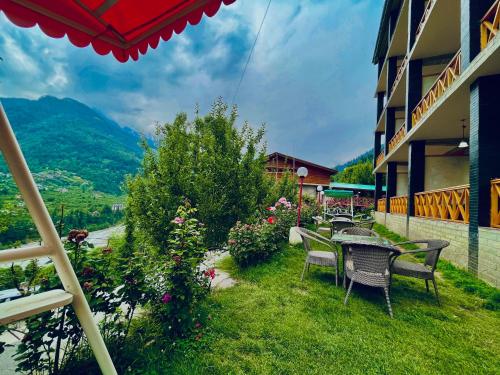 Imagen general del Naina Deventure Resort, Manali - Premium Rooms with Centrally Heated & Scenic View. Foto 18