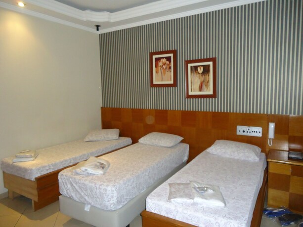 Imagen de la habitación del Namorata Expo Inn. Foto 7